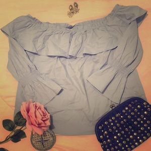 blue blouse down the shoulders